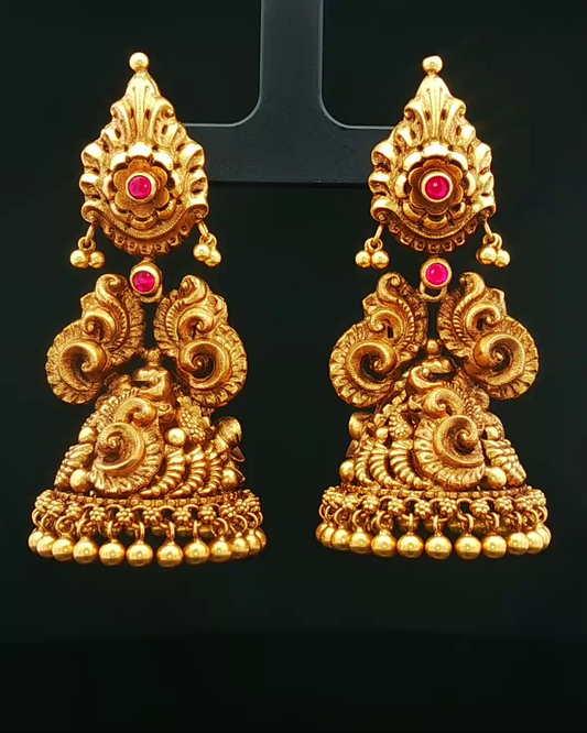Antique Yellow Gold Nakshi Jhumka Earrings with Round Cabochon Rubies