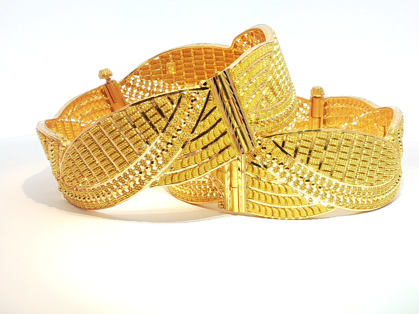 Intricate Textured 22KT Gold Bangles.