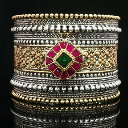 Ornate Two-Tone Silver Bangle with Red Rubies
