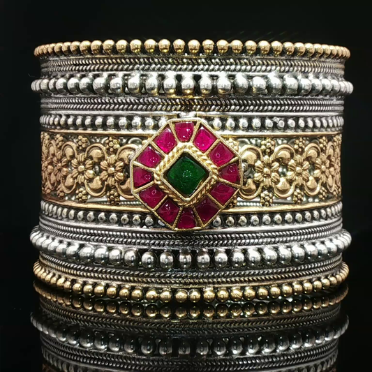 Ornate Two-Tone Silver Bangle with Red Rubies
