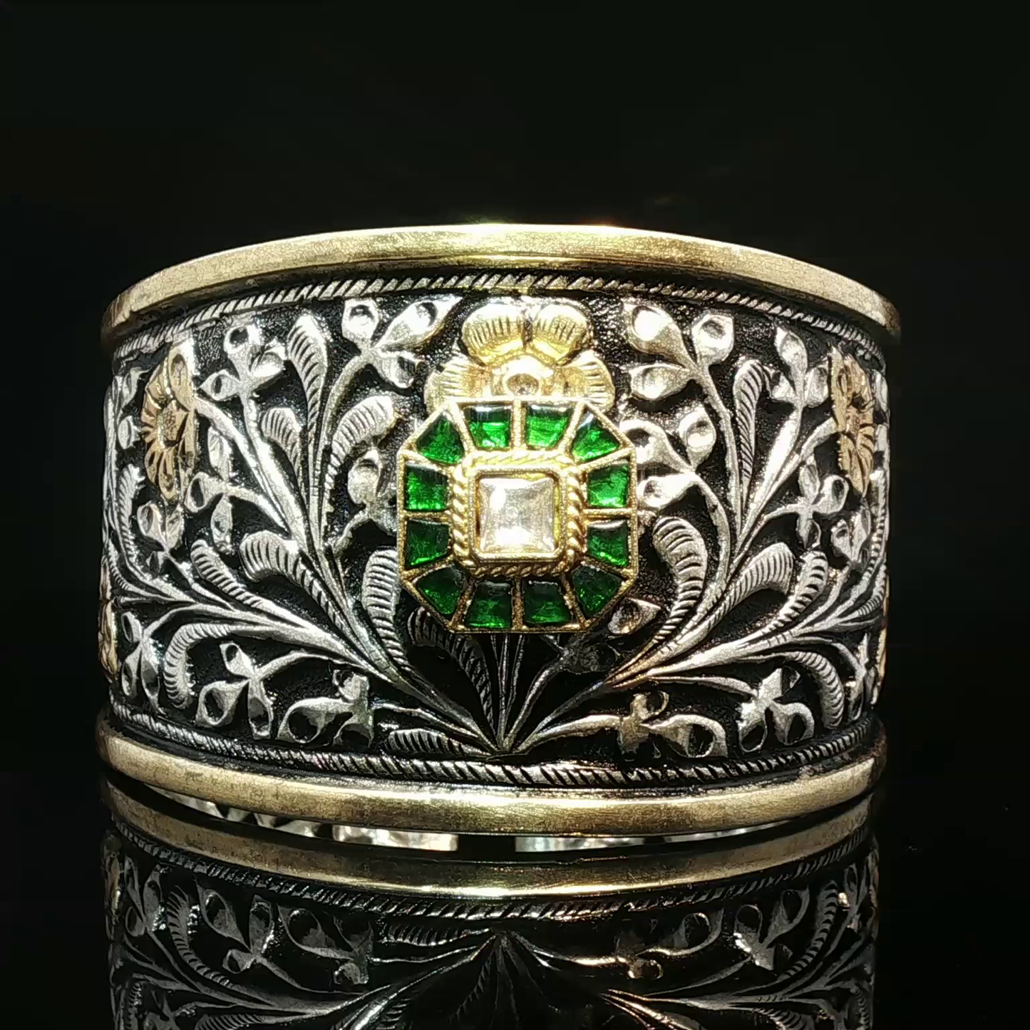 Ornate Floral Relief Silver Bangle with Emerald and Diamond Cluster Centerpiece Emerald Halo