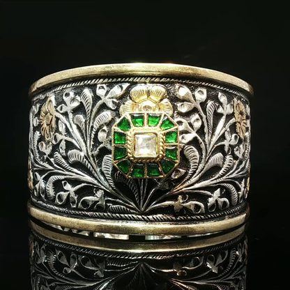 Ornate Floral Relief Silver Bangle with Emerald and Diamond Cluster Centerpiece Emerald Halo