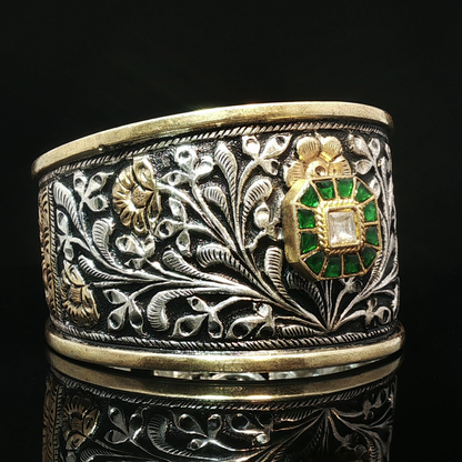Ornate Floral Relief Silver Bangle with Emerald and Diamond Cluster Centerpiece Emerald Halo