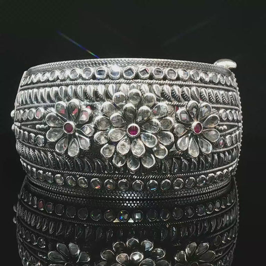 Floral Motif Silver Bangle with stone Accents