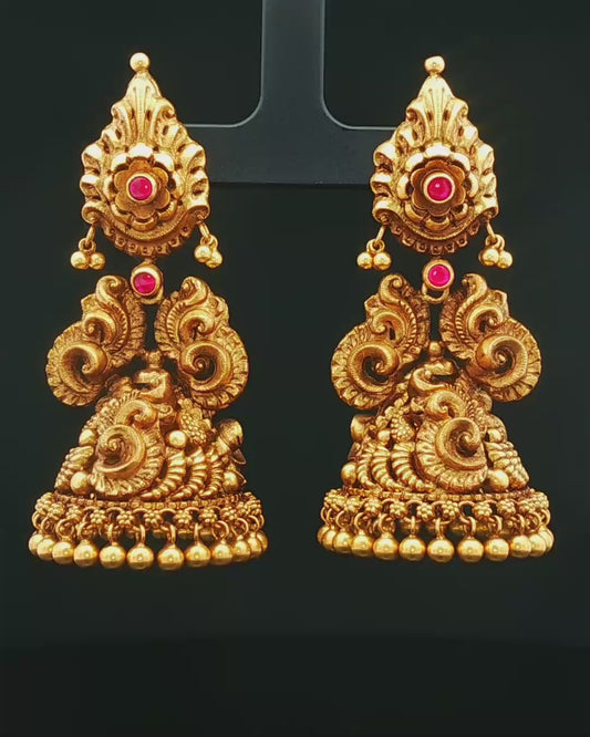 Antique Yellow Gold Nakshi Jhumka Earrings with Round Cabochon Rubies