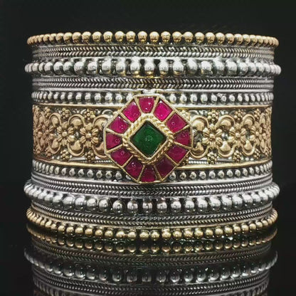 Ornate Two-Tone Silver Bangle with Red Rubies