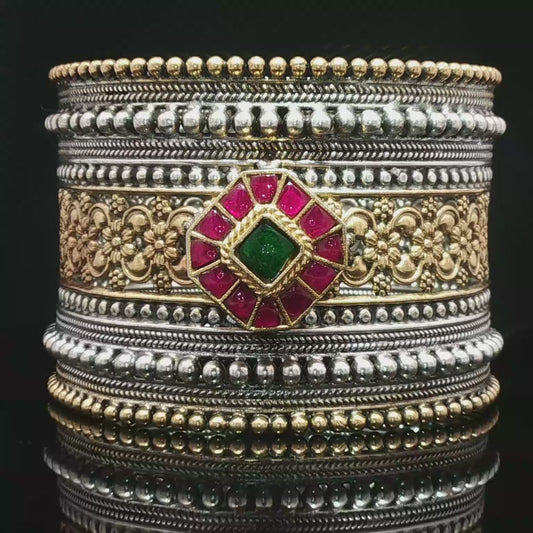 Ornate Two-Tone Silver Bangle with Red Rubies