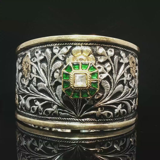 Ornate Floral Relief Silver Bangle with Emerald and Diamond Cluster Centerpiece Emerald Halo